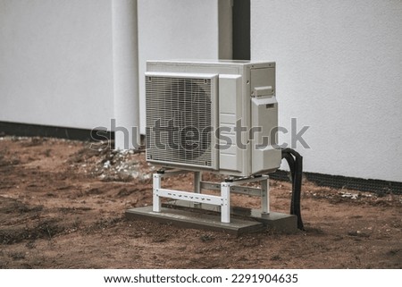Ground Source Heat Pump Unit. Heat pump on the ground. Heat pump - the efficient source of heat. Sustainable future heating. Royalty-Free Stock Photo #2291904635