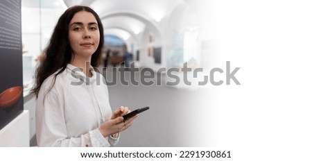Web banner of digital museum app and modern education. Portrait of young Caucasian woman using smartphone. Copy space and mock up.
