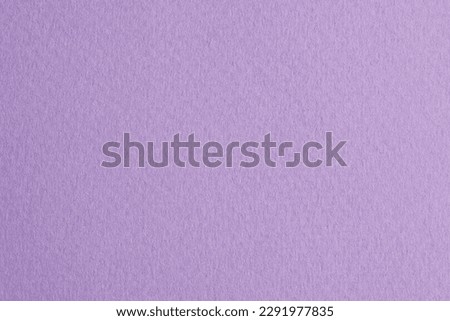 Rough kraft paper background, monochrome paper texture lilac color. Mockup with copy space for text Royalty-Free Stock Photo #2291977835