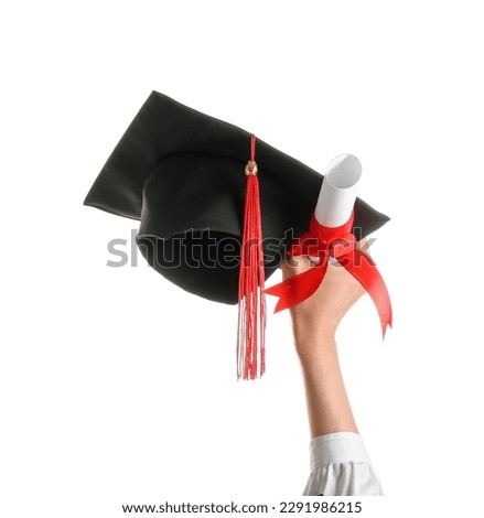 Woman with graduation hat and diploma on white background Royalty-Free Stock Photo #2291986215