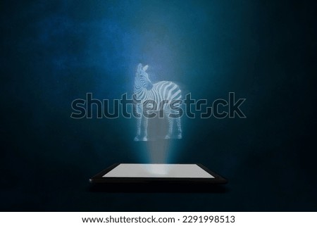 A projection from a mobile phone or tablet with a blue background of a zebra.