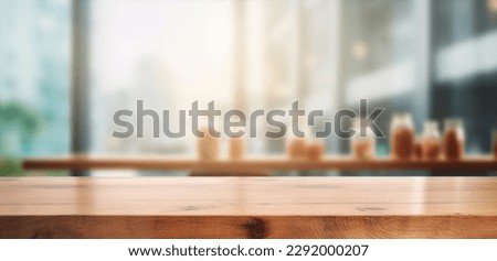 wood table on blur of cafe, coffee shop, bar, background - can used for display or montage your products Royalty-Free Stock Photo #2292000207