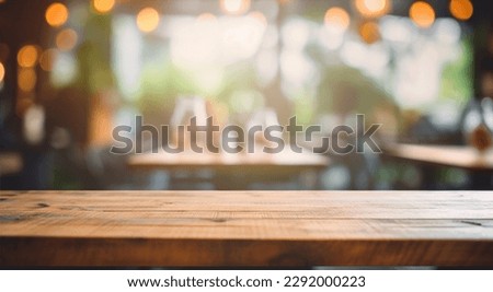 wood table on blur of cafe, coffee shop, bar, background - can used for display or montage your products Royalty-Free Stock Photo #2292000223