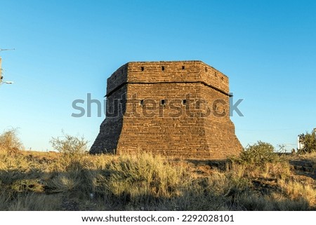 A blockhouse on a hill guarded Prieska during the Second Boer War. It was built from semi-precious tigers eye stones Royalty-Free Stock Photo #2292028101