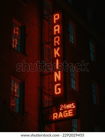 Vintage parking neon sign at Red Ball Garage, Manhattan, New York