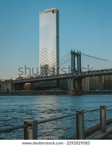View of out-of-place tall building and the Manhattan Bridge across the East River, Brooklyn, New York