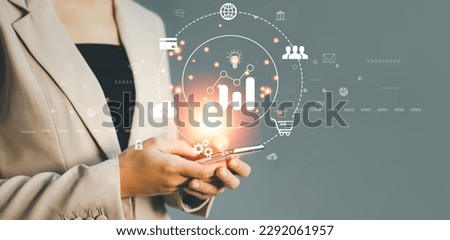 Businesswoman using smartphone connect and manage visual digital data online shopping. Technology and business concept