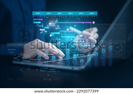 businessman using technology icon. Data analysts chart icon showing on screen laptop.