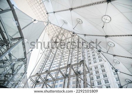 La Défense is a major business district in France, is Europe's largest purpose-built business district, covering 560 hectares (for 180,000 daily workers with with 72 glass and steel buildings. Royalty-Free Stock Photo #2292101809