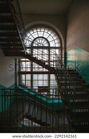 Old staircase inside historical building.