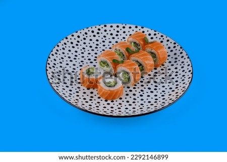 salmon rolls on blue background for online restaurant menu