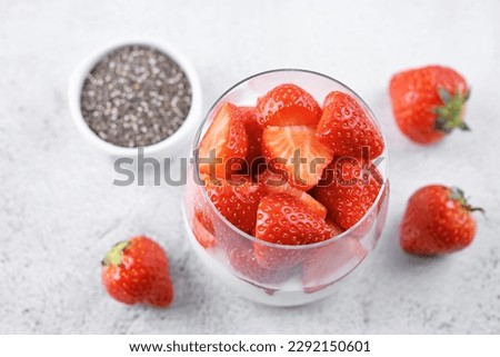 Greek yogurt Chia seeds strawberry parfait. toning. selective focus