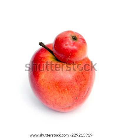 Red double Conjoined apple on white background
