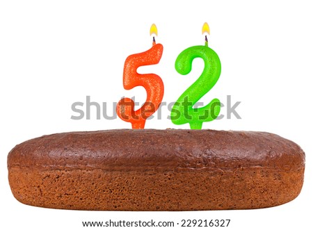 birthday cake with candles number 52 isolated on white background