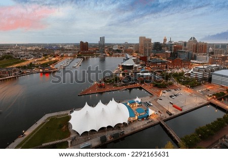 Bird's eye view of the Baltimore’s Inner Harbor at sunset, Maryland.  Baltimore is a major city in Maryland with a long history as an important seaport.