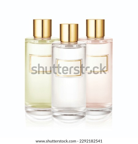 Three Bottle of Perfume Spray. Women's Eau De Parfum in Beautiful Glass Bottle and Gold Cap Isolated on White. Modern Luxury Parfum De Toilette. Fragrance for Women Royalty-Free Stock Photo #2292182541