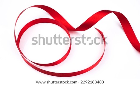 Abstract shape color red ribbon isolated on white background.