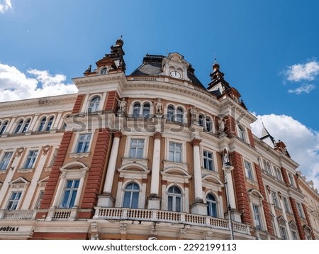 Old Main Post Office Building Exterior in Karlovy Vary, Czech Republic from the Austro Hungarian Empire with Four Allegorical Statues Representing Telegraph, Railway, Ship Transport and Mail Royalty-Free Stock Photo #2292199113