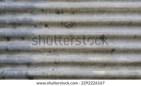 the texture of asbestos is visible up close with the corrugated surface