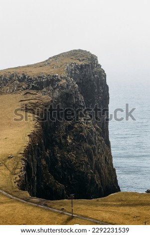 Neist Point a famous lighthouse in Scotland that can be found on the most westerly tip of the Isle of Skye near the township of Glendale. foogy day