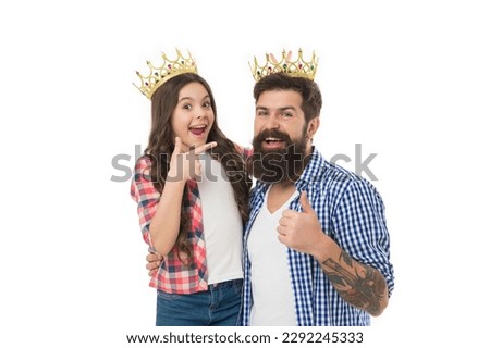Fatherhood concept. Fun with daughter. Royal family. Man golden crown and little girl kid. King and princess. Happy family white background. Bearded man proud of his daughter. Play game with daughter