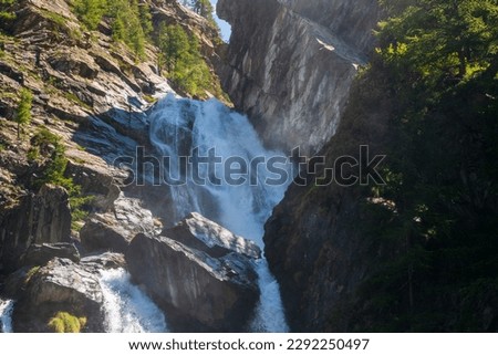 The beautiful Lillaz waterfalls in the Aosta Valley in the Gran Paradiso National Park Royalty-Free Stock Photo #2292250497