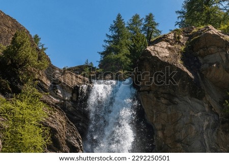 The beautiful Lillaz waterfalls in the Aosta Valley in the Gran Paradiso National Park Royalty-Free Stock Photo #2292250501