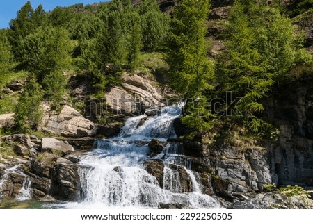 The beautiful Lillaz waterfalls in the Aosta Valley in the Gran Paradiso National Park Royalty-Free Stock Photo #2292250505