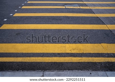 Yellow caution line on the road