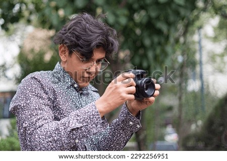 Photographer taking photos on the street 