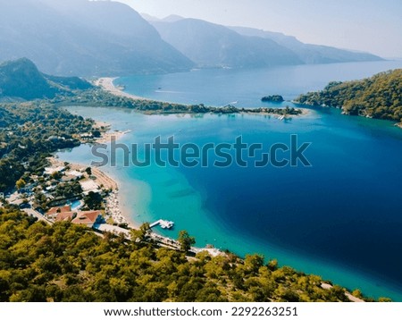 Aerial drone photo of Ölüdeniz, Fethiye, Turkey, showcasing the turquoise waters, picturesque coastline, and beautiful beaches of this popular summer destination. Royalty-Free Stock Photo #2292263251