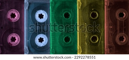 Set old audio cassette tapes collection.Top view on vintage media devices, copy space on labels, flat lay. 80s retro music background.  