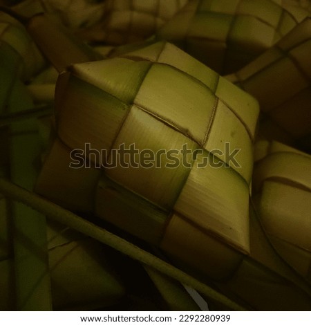 This is a ketupat and ketupat rice from the word kupat which means confess lepat (admitting mistakes) and behavior papat (four actions).