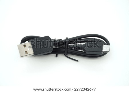 Charging cable or data cable micro usb 2.0 for electronic devices on white background Royalty-Free Stock Photo #2292342677