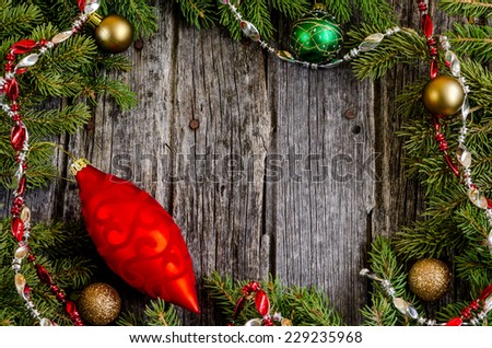 Full border of Christmas decorations of rustic wood