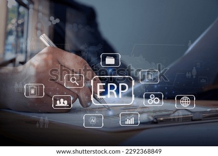 Businessman working with a laptop computer with icons,  interface, business plan, 
ERP concept