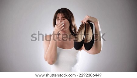 Smelly Shoes. Stinky Feet Sweat. Foot Odor Royalty-Free Stock Photo #2292386449