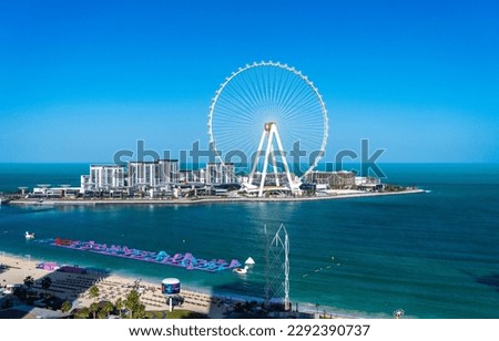 The Ain Dubai or Dubai Eye Observation Wheel on BlueWaters Island off the coast by JBR beach in the UAE Royalty-Free Stock Photo #2292390737