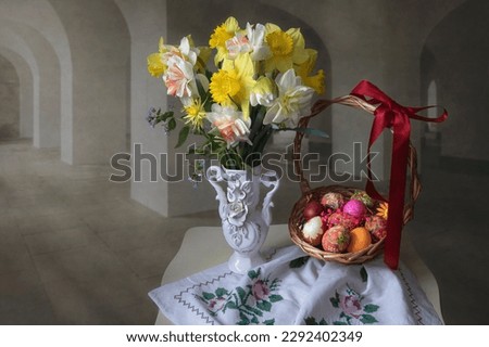 Easter greeting card with eggs and flowers