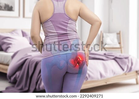 Hip joint pain, woman suffering from osteoarthritis at home, health problems concept Royalty-Free Stock Photo #2292409271