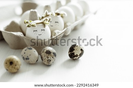 Cute easter eggs with funny smile faces in box. Happy easter concept.