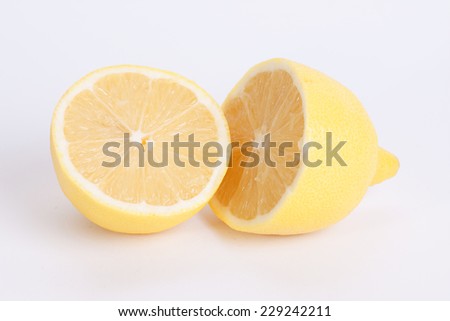 Citrus fresh fruit on white background. Ripe lemons.
