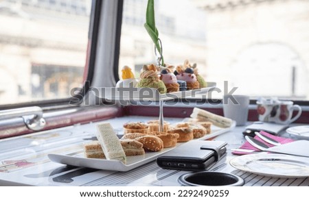 The classic Afternoon Tea bus tour in London Royalty-Free Stock Photo #2292490259