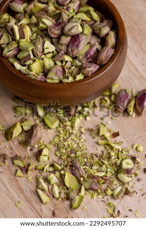 Crispy delicious pistachios with salt without shell, peeled and striped quality pistachio nuts