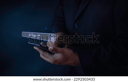AI searching concept. Data search optimization by artificial intelligence technology. Search engine bar with blank space for text and AI button appear while business person typing on laptop computer. Royalty-Free Stock Photo #2292503433