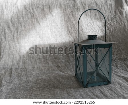 old dusty lantern without light