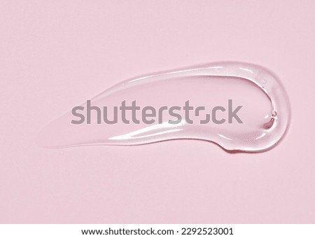 Gel texture swoosh swatch sample cosmetics. Cosmetic gel product with bubbles close up. facial jelly serum, cleanser, shower gel or shampoo Royalty-Free Stock Photo #2292523001