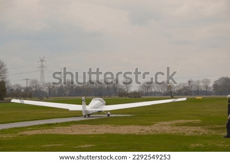 Glider plane Bergkirchen Oberbayern, takes off, Glider flying Royalty-Free Stock Photo #2292549253