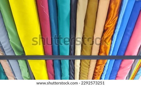 Abstract Photography. Background photo of textile cloth rolls in a boutique shop in Bandung City - Indonesia