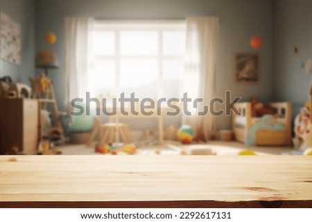 Wooden table free space over blur background of childrens room with kid toys. Product display presentation.